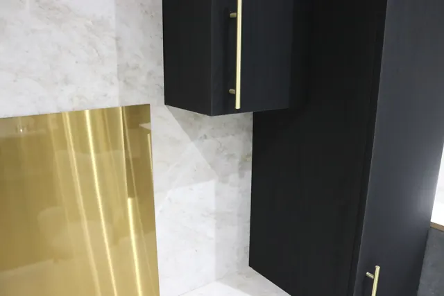 Gloss gold finish on a splashback