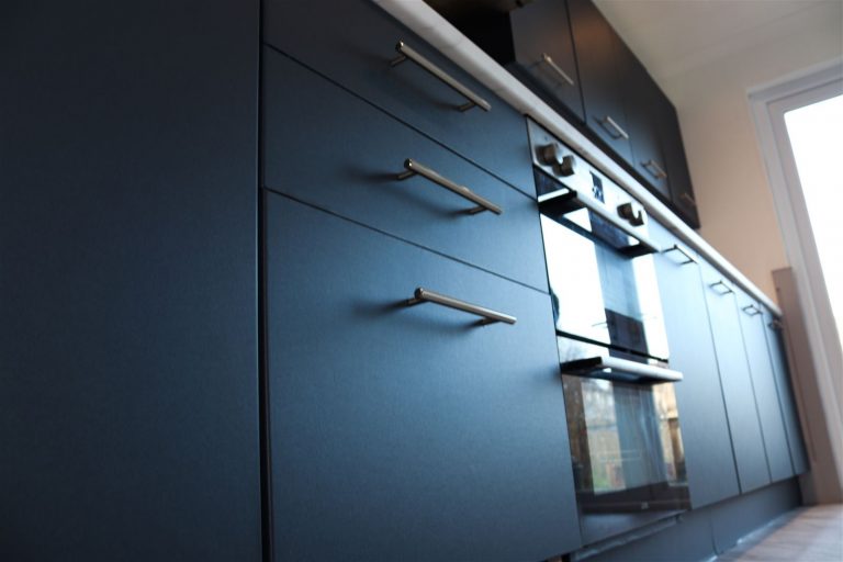 Navy matt wrapped kitchen
